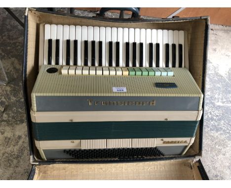 A RETRO CASED 'TRANSICHORD' ACCORDION 