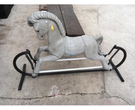 A VINTAGE PLASTIC ROCKING HORSE 