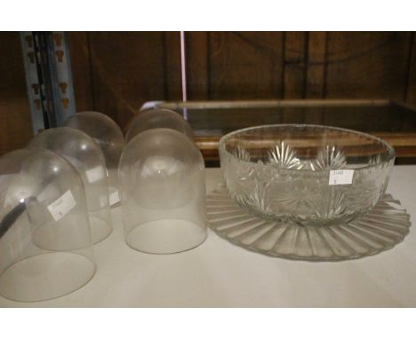     A set of five small glass domes, 12cm high a cut glass bowl and a dish