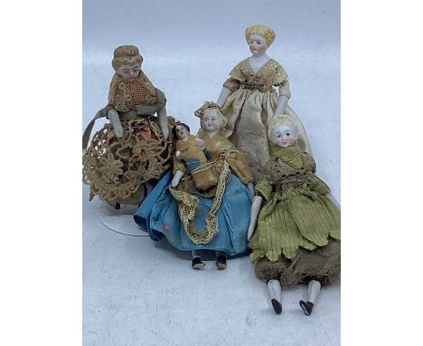 Antique miniature 19thC bisque dolls for a dolls house c 3.5&rdquo; tall with Parian heads and lower arms and legs and a spec