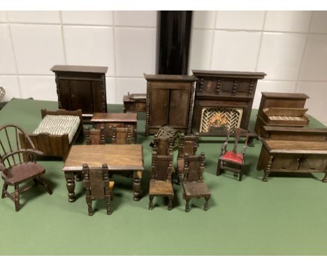 Antique dolls house Dark wooden old English styled to include Elgin Enfield and a variety including &nbsp;a piano, a large fi