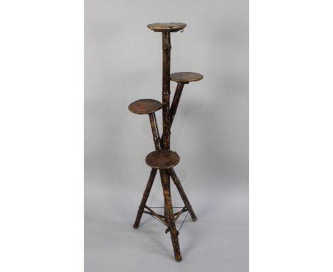 A Vintage Bamboo Four Section Planting Stand on Tripod Support, 125cm high 