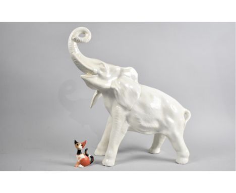 A Large White Glazed Ceramic Study of an Elephant Together with a Goebel Rosina Wachtmeister Cat 
