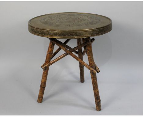 An Indian Circular Brass Top Table on Tripod Bamboo Base, 60cm Diameter 