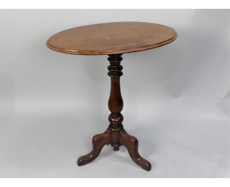 A Victorian Mahogany Oval Snap Top Tripod Table, 65cm wide 