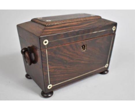 A Mid 19th Century Rosewood Two Division Tea Caddy of Sarcophagus Form, the Hinged Lid and sides with mother of pearl inlay, 