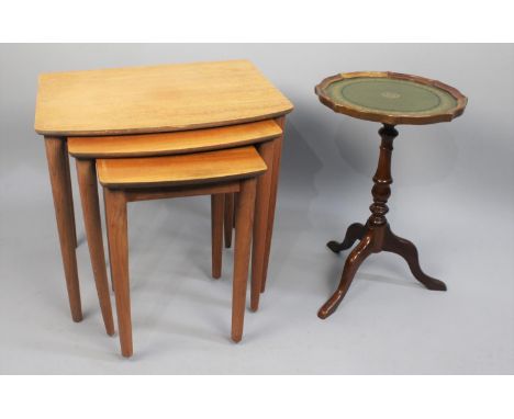 A Mid 20th Century Nest of Three Tables, 52cm wide Together with a Reproduction Tooled Leather Top Tripod Wine Table 