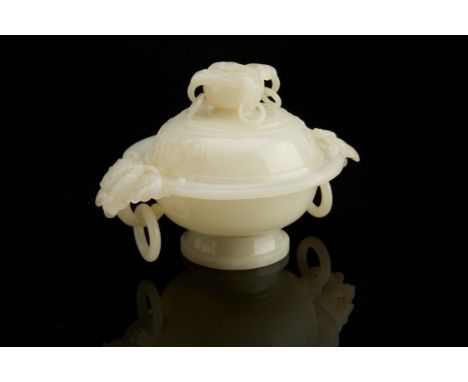 An incredibly fine 18th century Chinese white jade covered bowl decorated with sprays of flowers and dragonflies. Two butterf