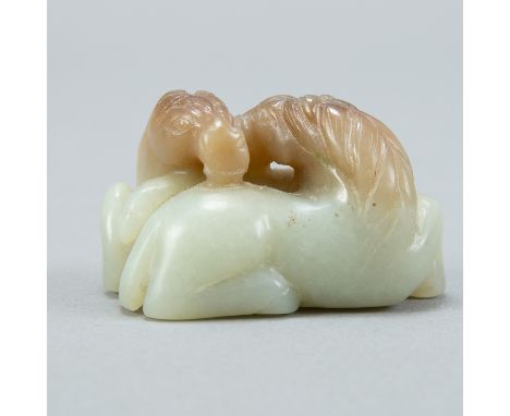 An excellent Chinese Qing jade carving of two horses nuzzling each other. Excellent integration of the color of the jade into