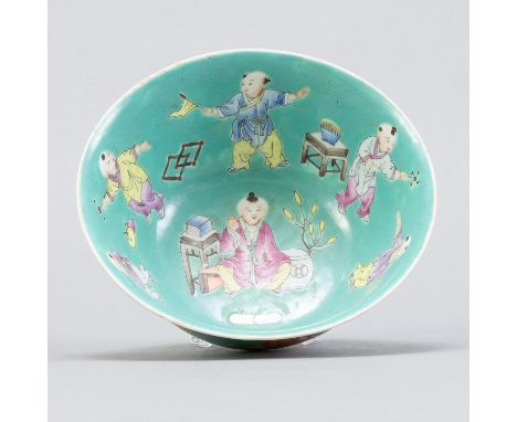 A fine turn of the century Chinese bowl decorated with playing boys. Excellent decoration and rare turquoise ground. Undersid