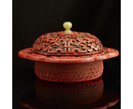 A stunning carved lacquer Ming Dynasty zhadou mounted with a lovely jade finial.For another zhadou and cover, see: S. Kwan in