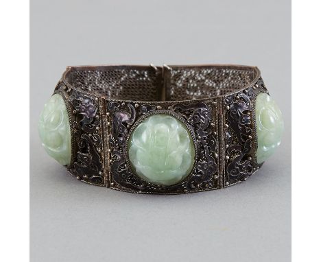 Chinese silver bracelet with black enamel. Five segments, three of which bear carved jade medallions. "China" is impressed on