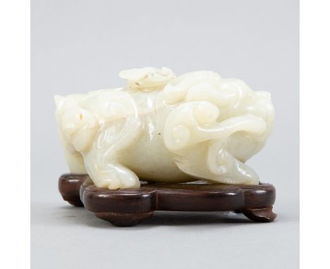 Chinese pale celadon jade carved inkwell in the form of a horned dog or lion. A two character mark incised on the underside. 