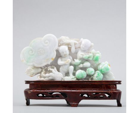 A fine white and green Chinese 20th century jade carving with an amazing carving of boys playing with a large Buddha's hand c