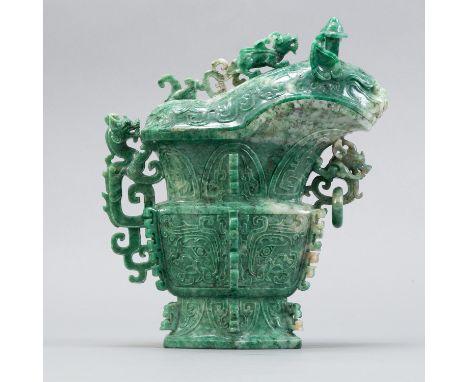 Chinese 20th century archaic form jade ewer. Dragons are carved into the lid, handle, and below the spout. Please note: this 