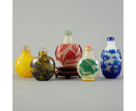 An excellent group of five Qing Dynasty Chinese snuff bottles, including some old glass overlay examples. Great additions to 