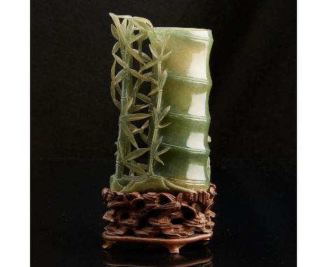A very finely carved green jade brush pot in the form of bamboo shoots. An excellent carving with very high quality natural j