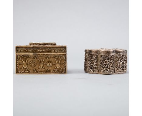 Two Chinese silver boxes, one inset with jade, reticulated. The one set with jade is marked "silver".  Dimensions: Rectangle 