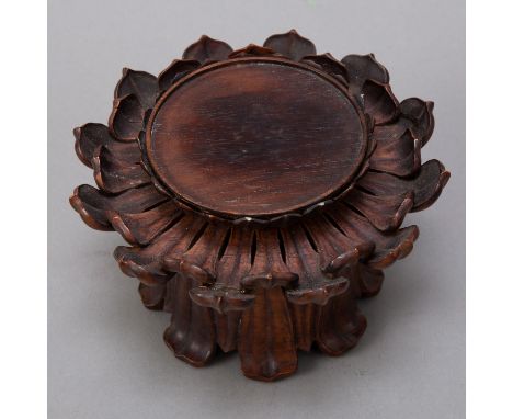 Exceptional carved Chinese rosewood stand. Made in the 19th century for a jade or porcelain bowl.  Dimensions: Height: 3 1/2 