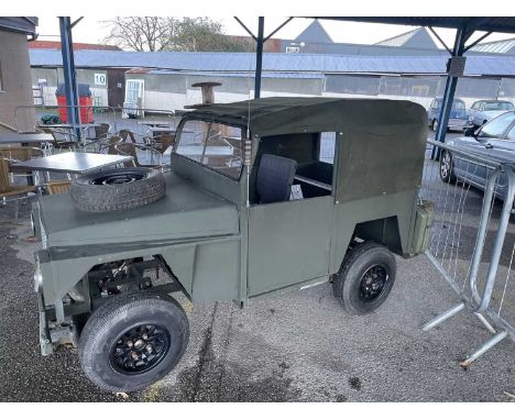 Homemade Land Rover toy car complete with canvass top. Body is made of a mixture of metal and wood with some very nice detail