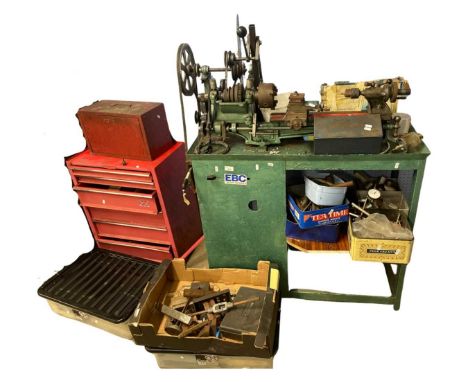 Vintage belt driven lathe by Gamages of London together with a workshop toolbox including all accompanying tooling for the la