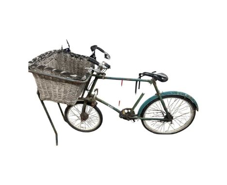 Vintage Pashley Bakers bike with basket and stand