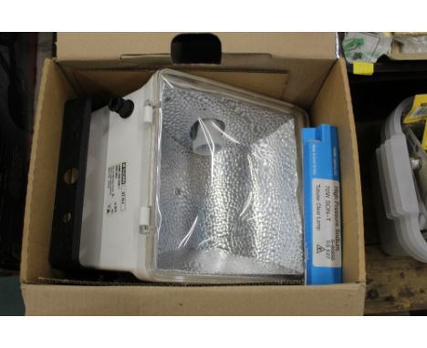 A large Thorn 70 watt flood light, boxed, un-used 