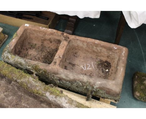 A sandstone trough with middle divide, 103 cm long x 44 cm wide x 28 cm high 