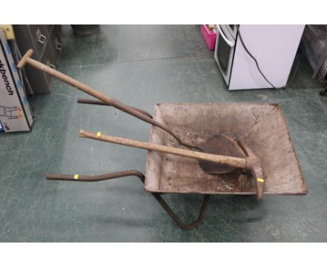Wheelbarrow, peat shovel, pick axe