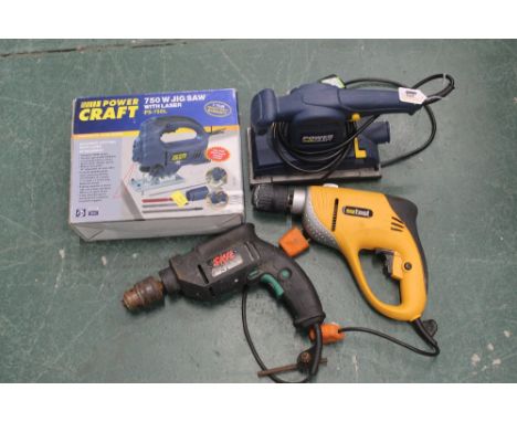 Boxed, un-used 750 watt jigsaw, two electric drills and an un-used Power Craft sander 
