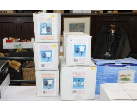 Six matching light fittings, one ceiling light and one five wall lights, boxed, un-used 