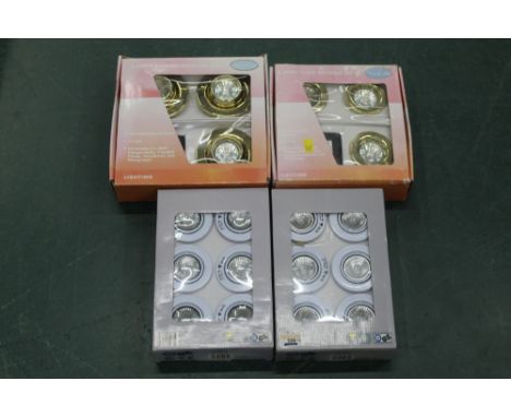 Four boxes of halogen recessed light fittings 