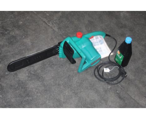 A Bosch AKE35S electric chainsaw (only used twice) and a bottle of chainsaw oil