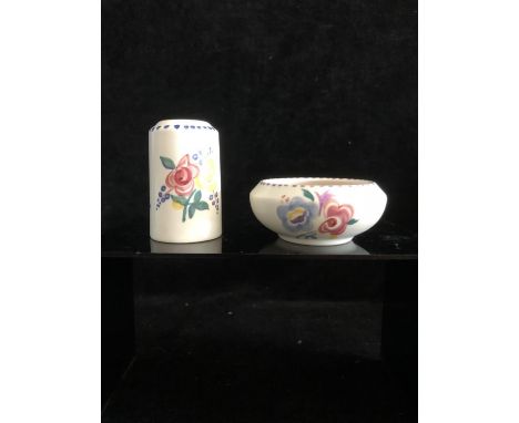 A Poole pottery pepperette; and an open salt, painted with polychrome floral sprays, the upper rims dotted in blue and purple
