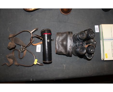 A pair of vintage spurs, two pairs of fields glasses and a monocular