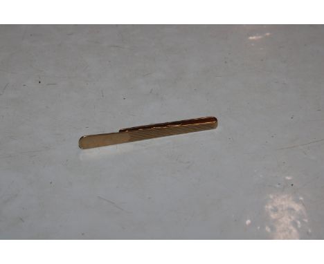 A 9ct gold tie clip, 7.8gms 