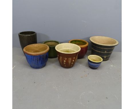 Seven various glazed ceramic plant pots. Largest 38x26cm. 