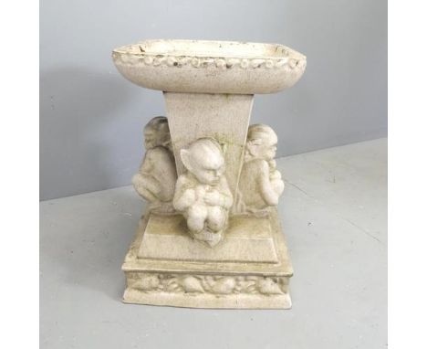 LEFCO A Victorian glazed ceramic bird bath, the central column surrounded by imps, with pedestal base. 46x66cm.No obvious mar