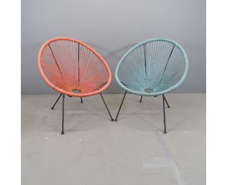 A pair of mid-century Acapulco style string chairs.In our opinion these are modern pieces, in the mid-century style rather th