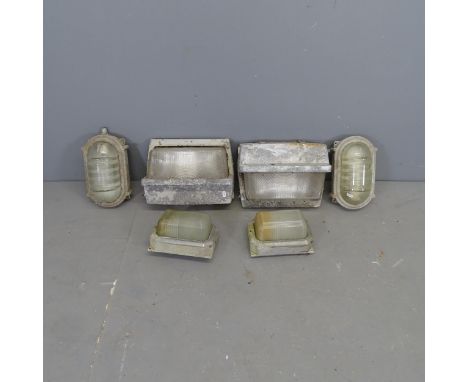Six various industrial wall light fittings. Largest 37x30cm. 