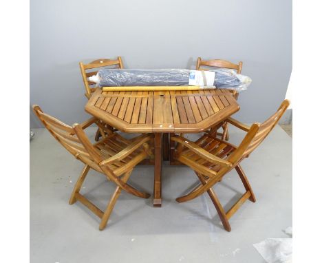 ALEXANDER ROSE - An octagonal teak drop-leaf folding garden table, 120x73cm, with four matching chairs, cushions, parasol and
