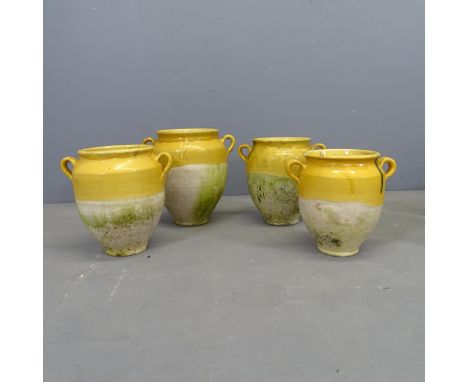 Four various French ceramic drip-glazed confit pots. Tallest 29cm. 