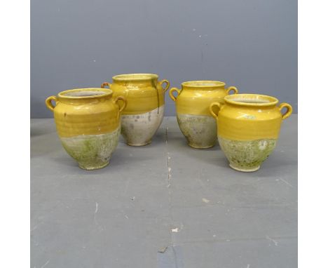 Four various French ceramic drip-glazed confit pots. Tallest 29cm. 