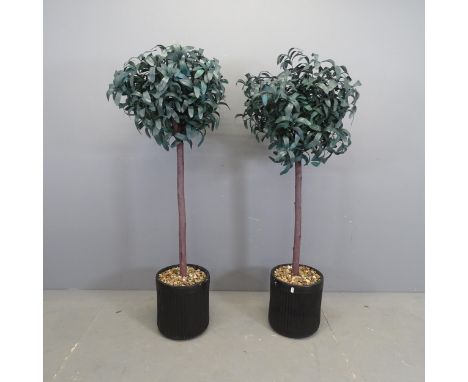 A pair of artificial bay trees in ceramic pots. Height 135cm.