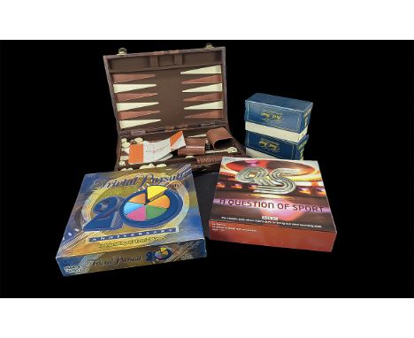 Collection of Boxed Games, including a Backgammon Set in a leather carry case, Trivial Pursuit with two extra boxes of questi