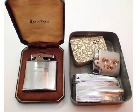 Vintage Oxo tin with lighters and a further boxed lighter 