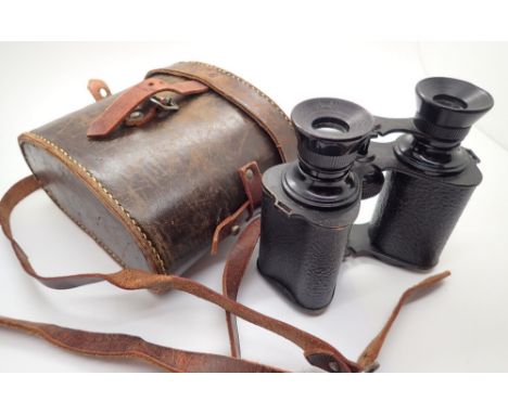 Leather cased extra power vintage binoculars 