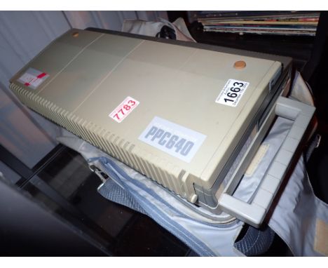 Vintage Amstrad PPC640 portable computer with leads and instruction booklet 