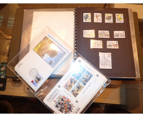 Album of mint stamps and first day covers 