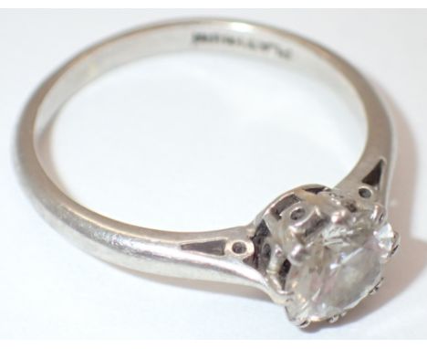 Platinum solitaire and diamond set ring approximately 0.75ct 2.9g size K  CONDITION REPORT: No visible inclusions, chips or d